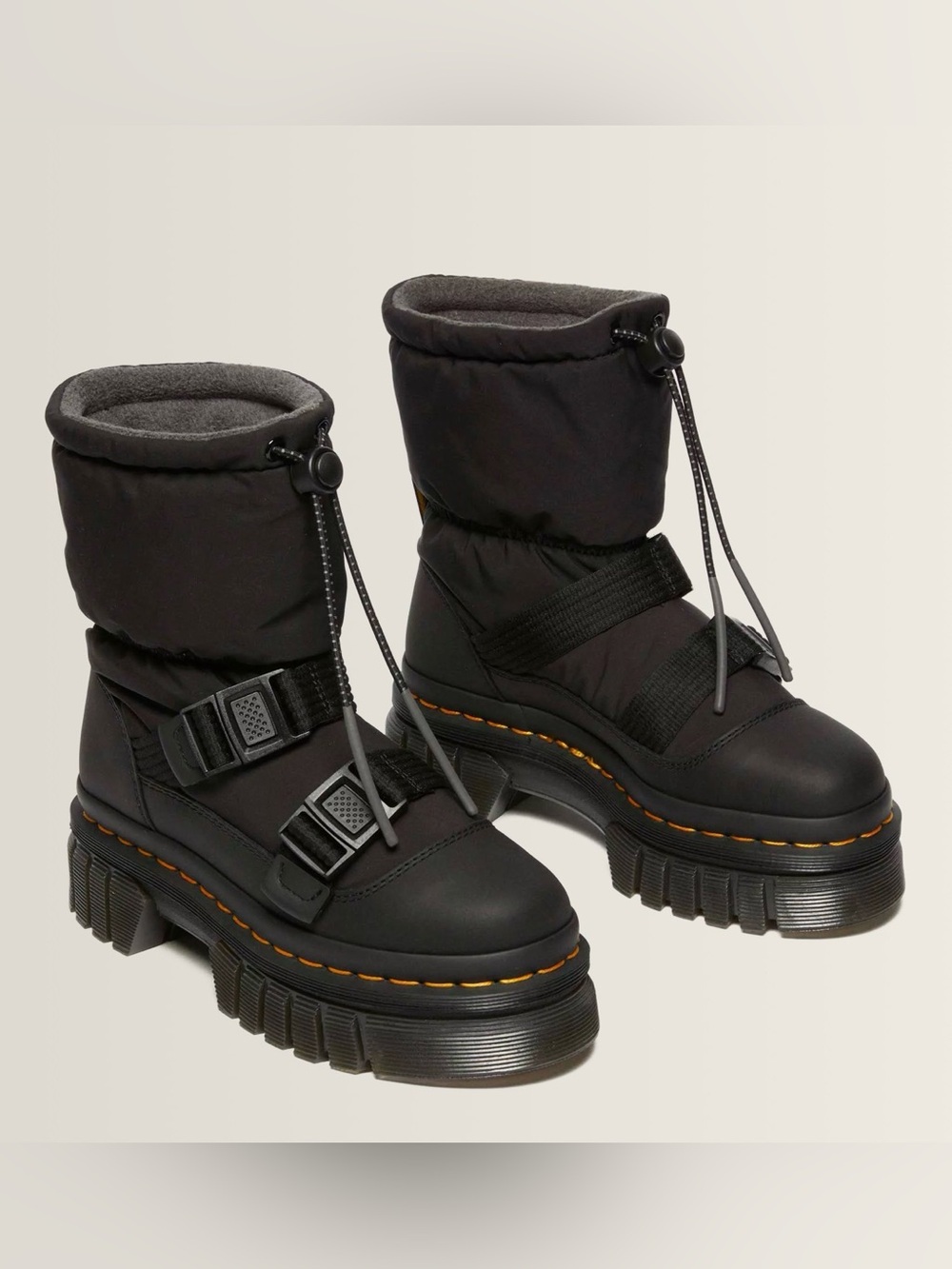 Dr. Martens Black Quilted Platform Lug Boots with Orange Stitching